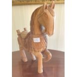 A SUBSTANTIAL TROJAN inspired ornamental hand carved wooden horse - dimensions height 40cm x