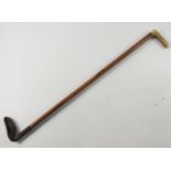 A VINTAGE quality 70cm long wooden riding crop with horn handle