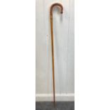 A beautiful handmade in The Scottish Borders shepherd's crook inspired walking stick with brass