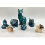A small collection of POOLE POTTERY land animals to include a cat (17cm), a badger (10cm tall), a