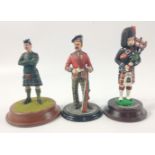 Three hand-painted metal Scottish soldiers to include a BLACK WATCH PIPER (11cm tall), and 2 others