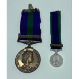 A British Service medal with ribbon for MALAYA complete with its original presentation display