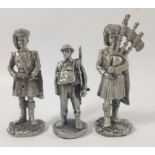 Three unpainted pewter soldier figures to include a PIPER (11cm tall), a DRUMMER (minus drum 10cm