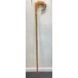 A HANDMADE in the Scottish Borders a sheherd's CROOK style walking stick with a feature THISTLE
