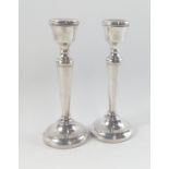A pair of hallmarked silver, Birmingham 1984, candlesticks by silversmith A T Cannon, stand 22cm