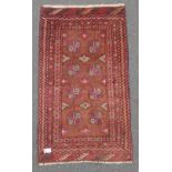 HANDMADE Small AFGHAN prayer mat size carpet, in typical geometric design in browns and reds -