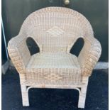 A single WICKER conservatory chair - nice and comfy