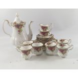 A ROYAL ALBERT 'Old Country Roses' coffee set consisting of 1 coffee pot, 1 creamer and open sugar