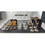 A mixed collection of glasses to include 3 champagne flutes, 4 tumblers, 2 whisky tumblers