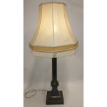 Substantial brass column table lamp with shade