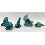A small collection of POOLE POTTERY sea animals to include, a leaping salmon (13cm high), an otter