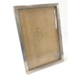 NICE QUALITY! A SUBSTANTIAL1923 Hallmarked silver framed large photo-frame with hardwood backing -