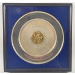 A silver plate, made by the Danbury Mint and hallmarked Birmingham Silver Jubilee 1977, with a