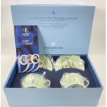 A WEDGWOOD commemorative boxed set (still in its original wrappers of MILLENNIUM two cups and
