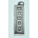 A 1977 Sheffield silver ingot pendant, gross weight 30g initials 'ER'