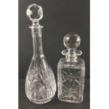 Two stunning crystal decanters with golfball stoppers, the taller for sherry or wine stands 35cm