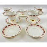 A part PARAGON 'Elegance' tea service in white with red and gilt design, to include 3 cups (1