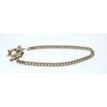 A 375 stamped yellow gold bracelet with feature inter-linking feature with four small blue stones