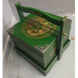 An ORIENTAL HIGHLY decorative green and gold painted lacquered with carry handle mock food carrier