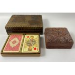 Two carved wooden boxes, the first Polish (17x14x12cm), the second Indian (10x10x5cm) with a box
