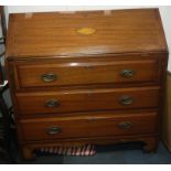 An EDWARDIAN bureau with shell motif, green leather writing pad and 3 drawers