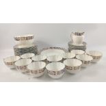 A VINTAGE 11 cup QUEENS CHINA patterned fine bone china tea service with gold trim - 39 pieces