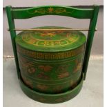 An ORIENTAL HIGHLY decorative green and gold painted lacquered with carry handle mock food carrier