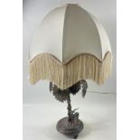 A VINTAGE WMF EP stamped white metal feature table lamp with shade depicting a SCOTTISH STAG with