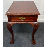 A mahogany effect rectangular coffee table with single drawer with cabriole legs on ball and claw