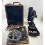 A vintage 1939 PATHESCOPE "200-B" PLUS PROJECTOR for both 9.5 and 16mm films comes in its original