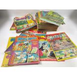 A large collection of late 70's and early 80's WALT DISNEY'S Mickey Mouse comics - approx 70