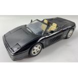 A Mira model 1989 FERRARI 348 in 1:18 scale in black, no box