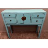 STATEMENT PIECE! An ORIENTAL pale blue distressed-painted lacquered medium sized four drawer and