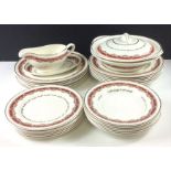 A vintage dinner service by PORTLAND POTTERY in cream with red and gilt pattern, to include 6