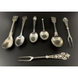 A small collection of 5 spoons and 2 pickle forks (1922) to include a spoon with twist handle