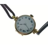 A 375 yellow gold stamped cased ladies wrist watch with engraved monogram to the back of the watch