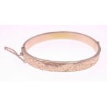 An 750 stamped snap bracelet approx 6cm dia, gross weight 9.6g