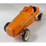 Perfect for the executive desk - a vintage highly polished wooden racing car 29cm long