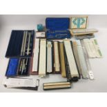 Box containing a substantial collection of Engineering Draughtsman equipment slide rules etc to