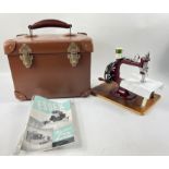 Hard to find - from the 1950s - the hand-operated ESSEX MINIATURE SEWING MACHINE, in original case