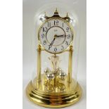 A vintage ACCTIM QUARTZ dome clock, made in West Germany stands approx 25cm high, keeps good time