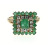 A STUNNING 18 stamped yellow gold Emerald and Diamond studded dress ring size S with 12 diamonds -