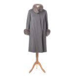 An angora wool and fur coat by Basler,