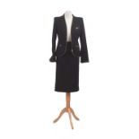 A wool two-piece suit by Alexander McQueen,