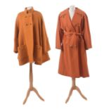 Two orange coats by Guy Laroche,