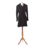 A black wool coat by Gianni Versace Couture,