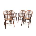 Four mid 19th Century yew and elm low back Windsor chairs