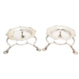 A pair of George V silver table warmers,