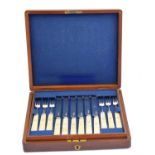 A William IV cased set of silver dessert knives and forks,