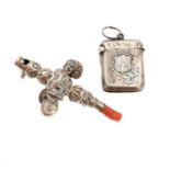 A silver and coral rattle and a silver vesta,